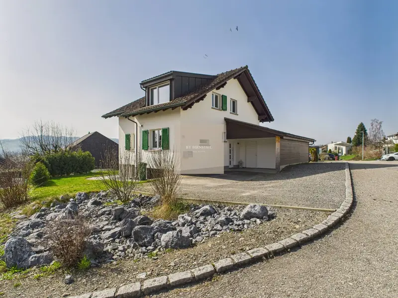 Fully renovated single-family house in Zetzwil from outside, with carport